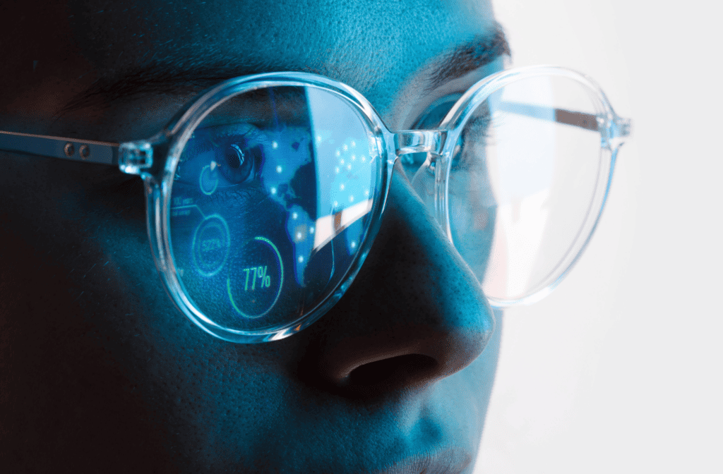 women with glasses reflecting digital maps