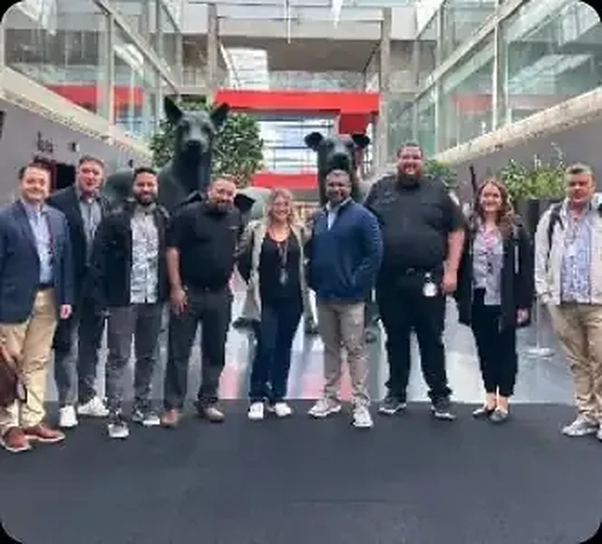 Careers 3 Trackforce team members together at a company event